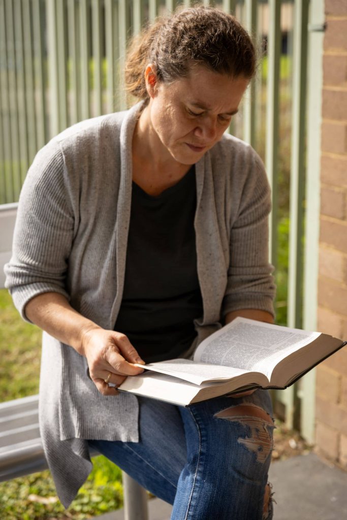 The Well Training - Woman reading the bible